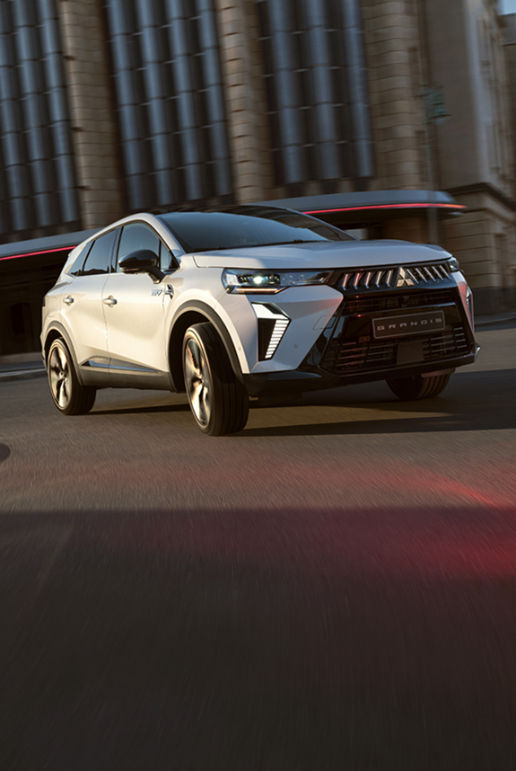 ¾-Frontalansicht des fahrendes Grandis